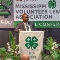 A man speaking at a podium.