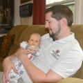 Boone Purser enjoys afternoon cuddles with his son, Benji, on Oct. 31, 2016. Benji is a breastfed baby who thrives on attention from both his parents at his home in Starkville, Mississippi. (Photo by MSU Extension Service/Linda Breazeale)