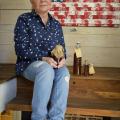 Dawn Morgan manages more than 20 hives at FloBaby Farms and sells raw honey, comb honey and beeswax from her home in Starkville, Mississippi on Nov. 22, 2016. (Photo by MSU Extension Service/Kevin Hudson)