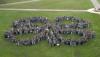 More than 600 4-H'ers gathered on the Mississippi State University campus to create a clover-leaf photograph to celebrate the 100th anniversary of 4-H in Mississippi. The perimeter of the shape was mapped out using GIS and GPS technologies.