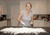 Christa Lee, owner of LoveLee Rolls in Starkville, Mississippi, flours her work surface on Sept. 30, 2016, as she prepares to bake cinnamon rolls for her cottage food business. (Photo by MSU Extension Service/Kat Lawrence)