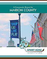 Advertisement for Marion county with a blue banner flying on a pole beside a building saying, 'shop, eat, live, play' with two flags flying beside it.