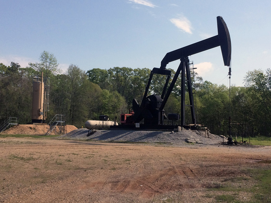 Large piece of machinery on a gravel platform.