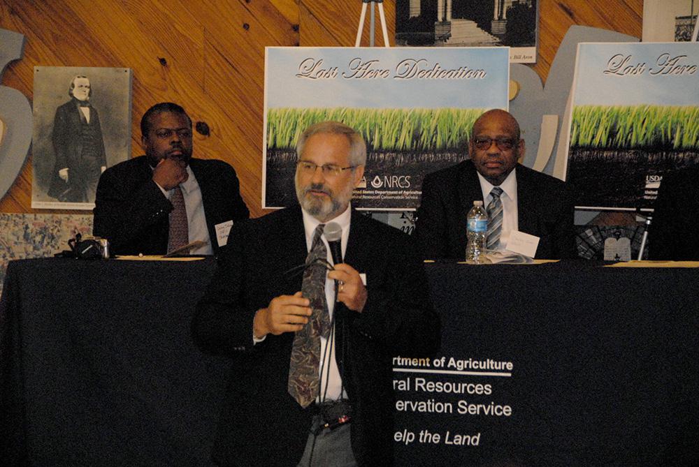 Mississippi Agricultural and Forestry Experiment Station soil scientist Billy Kingery (center), State Soil Scientist Delaney Johnson (left), and acting director of the U.S. Department of Agriculture's Soil Survey Division Charles Love join partners from several natural resources agencies to celebrate the completion of the Mississippi Soil Survey. The 114-year effort mapped over 30 million acres by soil type and appropriate usage. (Photo by MSU Ag Communications/Bob Ratliff)