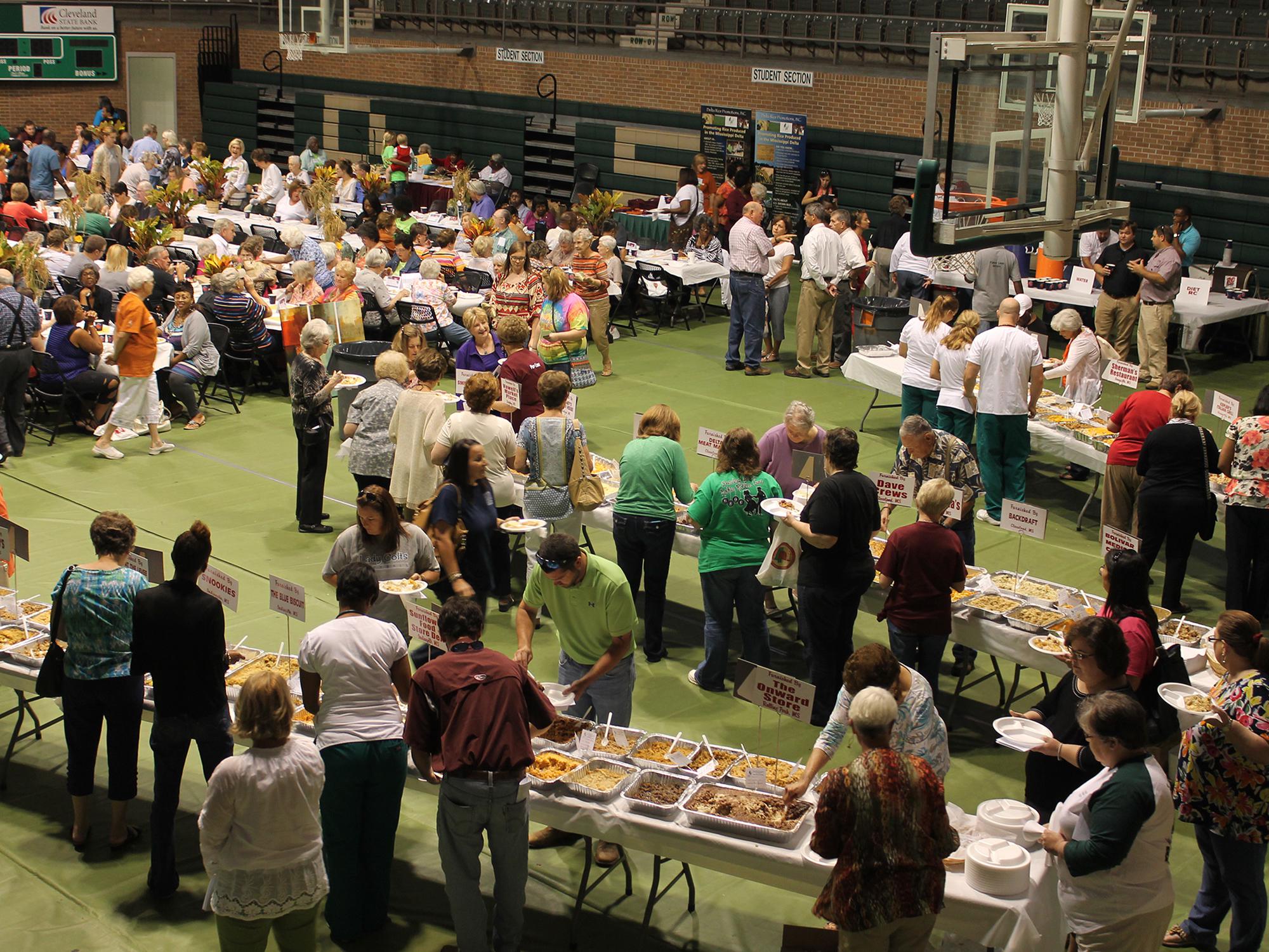 Attendees of the 27th annual Rice Tasting Luncheon can sample more than 300 rice dishes during the event Sept. 15, 2017, at the Delta State University Walter Sillers Coliseum in Cleveland. The luncheon is held in conjunction with National Rice Month and highlights Mississippi’s 17 rice-producing counties. (Photo by MSU Extension Service/file photo)