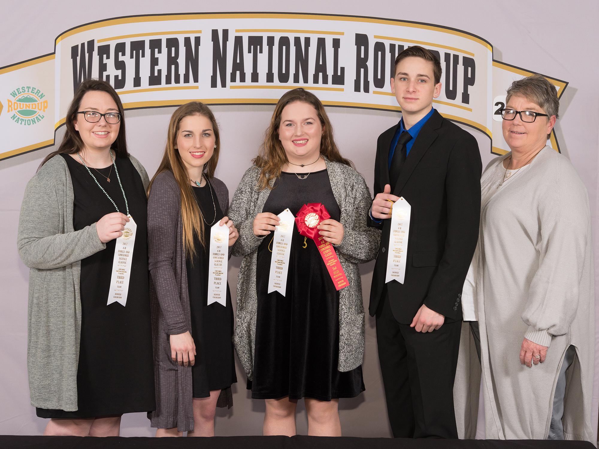 Chickasaw County 4-H members placed in the top 10 in consumer decision making at the Western National 4-H Roundup in Denver. Team members (from left) Shelby Abrams, Gracie Vickers, Lessie Vickers and Gage Vanlandingham earned sixth high point team overall, third high team overall, and eighth high team in overall reasons and overall group think. Vickers also placed second in individual high points. They are joined by Mississippi State Extension Service program associate Angie Abrams. (Submitted photo)