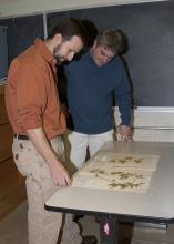 JoVonn Hill, left, and Chris Doffitt helped catalog the plant life in Lauderdale County. They used a variety of sources, including collections at Mississippi State University's Herbarium, to identify the plants they found. (Photo by Kat Lawrence)