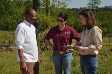 Winston County farmer Willie Lee Jr. discusses his losses from the April 28 tornado with Mississippi State University Extension Service disaster assessment team members Brandi Karisch (center) and Jane Parish, both of MSU's Department of Animal and Dairy Sciences. (Photo by MSU Ag Communications/Linda Breazeale)