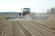 Sunny skies on March 26 provided perfect conditions for planting this corn on George Ray Walker's farm near Stoneville. This 12-row planter is preparing a plot for a nitrogen-rate plant population study for researchers with Mississippi State University's Delta Research and Extension Center. (Photo by Rebekah Ray)