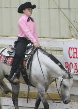 Noah Carpenter rides in a western pleasure class at the 4-H Winter Classic Horse Show held Feb. 11 at the Chickasaw County Agri-Center. (Photo by MSU Extension Service/Gina Wills)