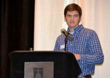 Jason Sarver, newly-hired peanut specialist with the Mississippi State University Extension Service and Mississippi Agricultural and Forestry Experiment Station, told a crowd of growers and industry representatives his research plans for the crop during the 9th annual Mississippi Peanut Growers Association meeting in Hattiesburg Feb. 12. The two-day meeting continues Feb. 13 and addresses factors that influence the crop's profitability. (Photo by MSU Ag Communications/Susan Collins-Smith)