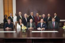 Participants in the Jimmy Bryan 4-H Youth Complex deed transfer ceremony on May 17, 2016, include (front row, from left) Tommy and Brenda Howard, 4-H donors; Harry Dendy, chair of the 4-H Club Foundation of Mississippi; Dr. Mark Keenum, president of Mississippi State University; and Dr. Gary Jackson, director of the MSU Extension Service; and (back row, from left) Dr. Paula Threadgill, associate Extension director; Jud Skelton, director of development for the MSU Foundation; Larry Alexander, 4-H state coord