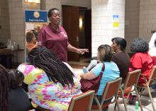 Dannie Bolden, Wilkinson County nutrition educator with the Mississippi State University Extension Service, speaks to participants of the wellness event about reducing fat and sugars in their diets in Natchez, Mississippi, on Aug. 9, 2016. (Photo by MSU Extension Service/Kevin Hudson)