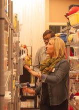 Chrissie Ryals, an Extension associate with the Early Years Network, guides a local resident through resources available at the Central Mississippi Resource and Referral Center in Canton, Mississippi. (MSU Extension Service file photo)