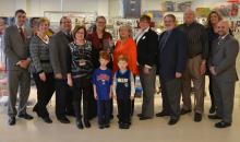 The Grenada Early Learning Advantage Center, part of the Mississippi State University Extension Service’s Early Years Network, received a Star Award from the Grenada Chamber of Commerce on Feb. 23, 2015. Leaders gathered at the center to celebrate the award, back row from left: Larry Collins of the Grenada Chamber of Commerce; Robbin Griffith of the Early Years Network; Michael Newman, director of the MSU School of Human Sciences; Wanda Thompson of the network; Deborah Bailey, consultant; Dolly Marascalco o