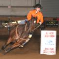 Kass Downen, an 11th grader from Illinois, makes a turn around a barrel at the March Madness Barrel Race held this spring at the Mississippi Horse Park in Starkville. Downen was this year's average champion and won $3,585 with four runs totaling less than a minute.