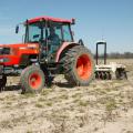 This tractor pulls a Veris cart, which uses satellite technology to map soil types. Researchers hope to connect soil types with reniform nematode populations so they can predict infestations and employ site-specific treatments. (Photo by Robert H. Wells/MSU Delta Research and Extension Center)