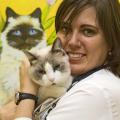 Stephanie Gandy-Moody and her cat, Isabelle, demonstrate that trust works wonders when handling feline patients. (Photo by Tom Thompson)