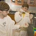 Mississippi State University biological engineering students Sam Pote of Starkville, left, and Caleb Dulaney of Collinsville conduct their research project on isolating an enzyme that initiates lignin breakdown in plant cells. (Photo by Marco Nicovich)