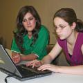 Chelsi Smith, 18, of Guntown, and Ashley Gray, 16, of Tupelo, complete a presentation for the upcoming state 4-H Club Congress at Mississippi State University May 27-29. Smith, a Saltillo High School graduating senior, will complete her year as president of the state 4-H Council during the event. (Photo by Patti Drapala)