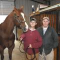 After multiple surgeries and extensive physical therapy for cerebral palsy, Jamie Mangum, pictured with his horse Bubba and grandfather James Roy Hawkins, shows halter horses without assistance. (Photo by Scott Corey)