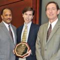 The Mississippi Board of Trustees of the State Institutions of Higher Learning recently presented Dr. Mark Lawrence with the Black History Month Educator of the Year award for Mississippi State University's Division of Agriculture, Forestry and Veterinary Medicine. Pictured: Trustee Bob Owen, co-chair of the Diversity Committee, Lawrence and Greg Bohach, DAVFM vice-president. (Submitted Photo)