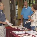 Rick Snyder, Mississippi State University horticulture expert, talks to Joseph Wilson, center, and Lynn Loecher at the microfarming workshop in Raymond on Aug. 28, 2014. The two-day event helped growers understand the benefits and facts of growing for and selling at farmers markets. (Photo by MSU Ag Communications/Kevin Hudson)