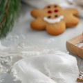 Snowman christmas cookies on wood cutting board