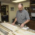 Mississippi State University Extension Service agronomy specialist Keith Crouse sorts through routine samples on April 10, 2013, in the MSU Soil Testing and Plant Analysis Lab, where every day is Earth Day, not just April 22. (Photo by MSU Ag Communications/Scott Corey)