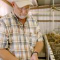 Mississippi State University Extension aquaculture specialist Jim Steeby inspects a catfish egg mass at the L&S Fish Farm catfish hatchery in Leland. (Photo by Robert H. Wells/MSU Delta Research and Extension Center)