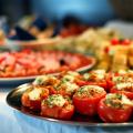 Trays of food are on a table.