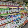 Rows of bagged items line the shelves in a store.