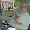 John Guyton, Mississippi State University Extension entomology specialist, shares an insect collection with a school group on Sept. 27, 2013, during Bugfest at the Crosby Arboretum in Picayune. Participants in this year's two-day event can take part in insect collection and identification, tours of the pitcher plant bog, tree identification hikes, a beekeeping tutorial and more. (Photo by MSU Ag Communications/Susan Collins-Smith)