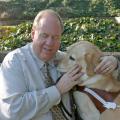 Michael Hingson escaped the World Trade Center on 9/11 by walking down 78 flights of stairs with his guide dog, Roselle. Hingson will talk about the human-animal bond that saved his life at the Mississippi State University College of Veterinary Medicine on Sept. 18, 2014. (Submitted Photo)