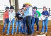 Tom McBeath of Union, Mississippi, explains a riding pattern he will judge to a group of young women. McBeath, a long-time volunteer with the Mississippi 4-H Program, is the American Youth Horse Council Adult Leader of the Year. (Photo by Jeff Homan)