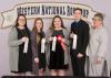 Chickasaw County 4-H members placed in the top 10 in consumer decision making at the Western National 4-H Roundup in Denver. Team members (from left) Shelby Abrams, Gracie Vickers, Lessie Vickers and Gage Vanlandingham earned sixth high point team overall, third high team overall, and eighth high team in overall reasons and overall group think. Vickers also placed second in individual high points. They are joined by Mississippi State Extension Service program associate Angie Abrams. (Submitted photo)