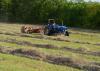 Johnny Howell rakes his last row of hay before moving on to the next field on Aug. 3, 2016, in the Bell Schoolhouse Community north of Starkville, Mississippi. The state’s hay production is projected to fall slightly this year, as growers face heat-induced infestations of fall armyworms. (Photo by MSU Extension Service/Linda Breazeale)