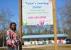 LaTonya Hill stands outside Tonya’s Learning Center, her new licensed child care center in Waynesboro, Mississippi on Feb. 18, 2016.